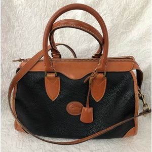 Vintage Dooney & Bourke black all weather leather satchel  bag.  $395.00